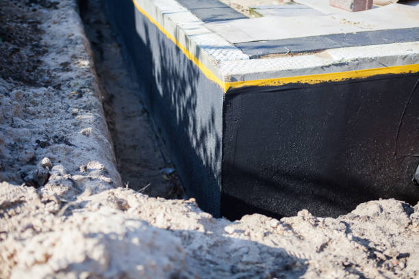 Professional Waterproofing technician working in Reading, MI